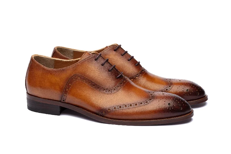 Men's formal shoes with a buckle closureTan Patina Brogues